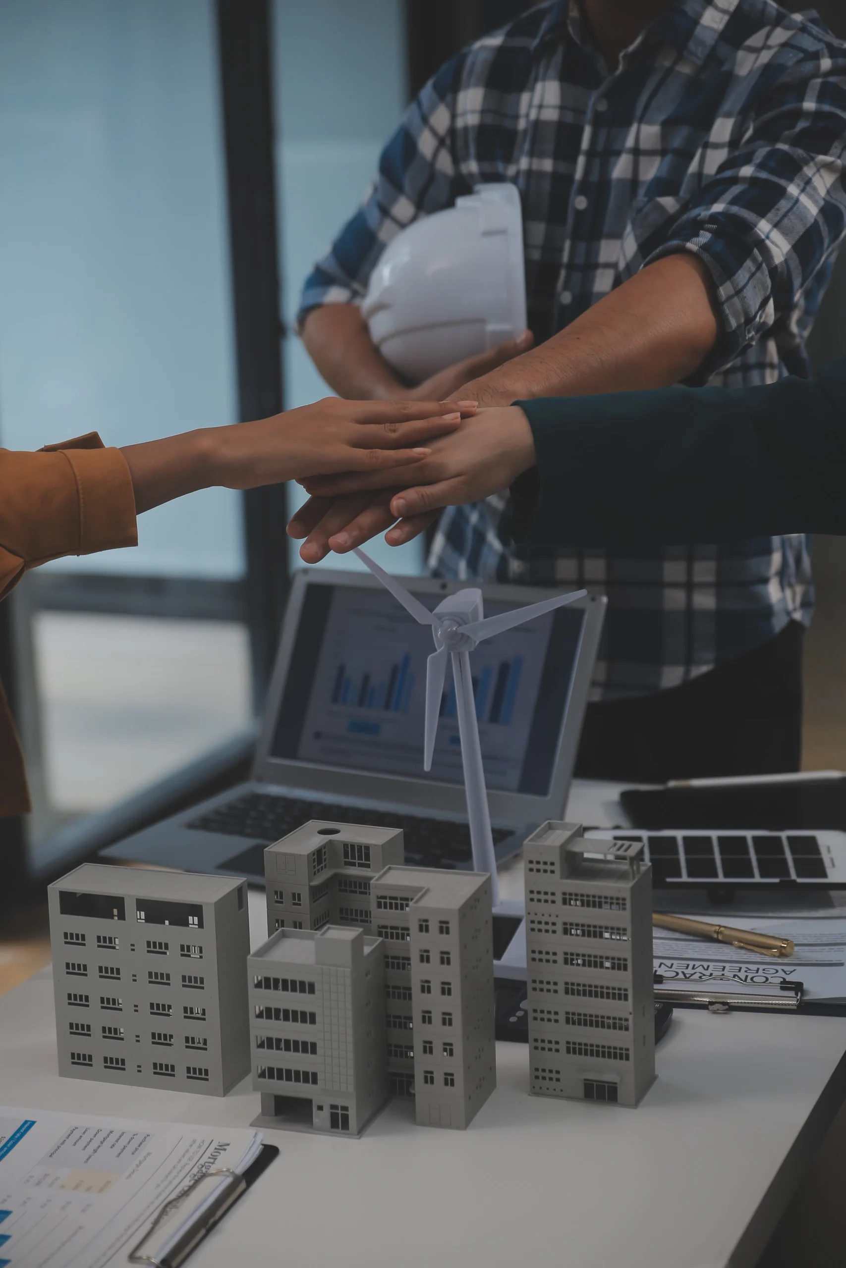 electrical-engineer-with-businessman-discussing-new-project-installation-solar-cell-panel-roof-building-alternative-energy-concept